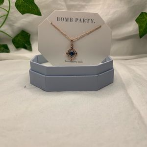 A bomb party necklace